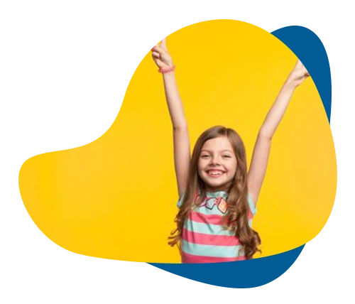 Joyful, confident girl celebrating with arms raised, representing child self-confidence therapy in Richmond Hill.